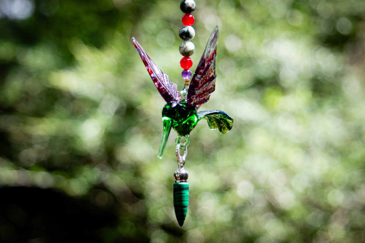hummingbird with malachite pendant